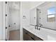 Modern bathroom with a clean vanity and dark brown cabinets at 437 Cascade Heights Ave, Las Vegas, NV 89138