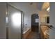 Bathroom with double sinks, tile floor, and a shower/tub combo at 5857 Red Dawn St, North Las Vegas, NV 89031