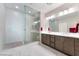 Elegant bathroom with double vanity and large walk-in shower at 19 Cresta Villa Ct, Henderson, NV 89011