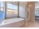 Relaxing bathroom with soaking tub and walk-in shower at 1940 Marks River Pl # Lot 33, North Las Vegas, NV 89084