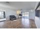 Living room with tile floors and sliding glass doors leading to a patio area at 2016 Embrey Ave, Las Vegas, NV 89106