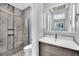 Modern bathroom with marble tile and updated fixtures at 2024 Orchard Mist St, Las Vegas, NV 89135