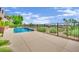 Inviting pool with a spacious patio and a built-in water feature at 2024 Orchard Mist St, Las Vegas, NV 89135