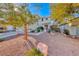 House exterior showcasing front yard and landscaping at 209 Turkey Creek Way, Henderson, NV 89074