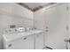 Convenient laundry room with washer, dryer and extra storage at 2157 Point Mallard Dr, Henderson, NV 89012