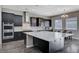 Spacious kitchen featuring granite countertops and dark cabinetry at 2815 Athens Ridge Dr, Henderson, NV 89052