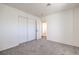 Spacious bedroom with carpet flooring and double door closet at 3304 Oeste Vista St, Las Vegas, NV 89129