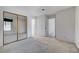 Bright bedroom with mirrored closet doors and neutral carpeting at 363 Rushing Creek Ct, Henderson, NV 89014