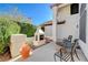 Relaxing patio featuring a fireplace and lush greenery at 363 Rushing Creek Ct, Henderson, NV 89014