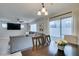 Dining area with a view of the living room and backyard at 4365 Raynham St, Las Vegas, NV 89115