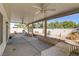 Covered patio with ceiling fan and built-in grill at 6086 Shadow Oak Dr, North Las Vegas, NV 89031