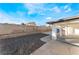 Landscaped backyard with gravel and a pool at 700 Connie Dr, Las Vegas, NV 89107