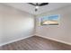 Bright bedroom with ceiling fan and wood-look flooring at 700 Connie Dr, Las Vegas, NV 89107