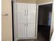 Convenient laundry room with washer, dryer and extra cabinets at 717 Reagan Dr, Las Vegas, NV 89110