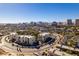 Aerial view of an apartment complex with a pool and tennis court, near the Las Vegas Strip at 730 S Royal Crest Cir # 426, Las Vegas, NV 89169