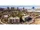 Aerial view of an apartment complex with a pool and tennis court, near the Las Vegas Strip at 730 S Royal Crest Cir # 426, Las Vegas, NV 89169