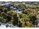 Aerial view of a community pool and tennis court at 730 S Royal Crest Cir # 426, Las Vegas, NV 89169