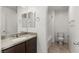 Bathroom with tub, toilet, vanity, and tiled floor at 8040 Mercury Skye St, Las Vegas, NV 89166