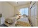 Charming bedroom with two twin beds and ample closet space at 10017 Snow Crest Pl, Las Vegas, NV 89134