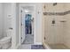 Bathroom includes a toilet, walk-in shower, and access to a large closet at 10554 Cloud Whisper Dr, Las Vegas, NV 89135