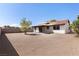 Spacious backyard with gravel and a covered patio at 110 Palo Verde Dr, Henderson, NV 89015