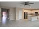 Kitchen with island, stainless steel appliances, and tiled floor at 11467 Monte Isola St, Las Vegas, NV 89141