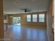 Spacious living room with tiled floors and sliding glass doors at 11467 Monte Isola St, Las Vegas, NV 89141