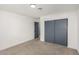 Bedroom with grey sliding doors and en-suite bathroom at 1408 S 16Th St, Las Vegas, NV 89104