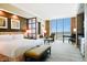 Spacious bedroom with large windows and city views at 145 E Harmon Ave # 804, Las Vegas, NV 89109