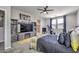 Main bedroom with TV stand and ensuite bathroom at 1934 Karner Blue Ave, North Las Vegas, NV 89031