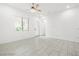 Spacious living room featuring tile floors and natural light at 2169 Radiant Horizon Ave, Henderson, NV 89052