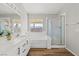 Clean bathroom, featuring double vanity and shower/tub combo at 310 Coral Fountain St, Henderson, NV 89014