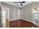 Bright bedroom, wood flooring, and ceiling fan at 310 Coral Fountain St, Henderson, NV 89014