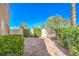 Private backyard patio with brick pavers and landscaping at 3244 Epson St, Las Vegas, NV 89129