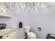 Small bathroom with granite countertop and updated fixtures at 3245 W Landberg Ave, Las Vegas, NV 89141