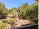 Landscaped backyard with a rock garden and fence at 3400 Cabana Dr # 1079, Las Vegas, NV 89122