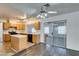 Kitchen with an island, stainless steel appliances, and light wood cabinets at 4516 Ryder Ln, North Las Vegas, NV 89031