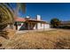 Backyard view showing home's exterior and covered patio at 6413 Marrow Rd, Las Vegas, NV 89108