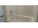 Simple bathroom with a shower/tub combo and neutral tile at 7368 N Decatur Blvd # 1, Las Vegas, NV 89131