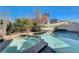 Inviting backyard oasis featuring a sparkling pool and spa at 10146 Robins Hollow Rd, Las Vegas, NV 89183