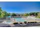 Community pool with spa and fenced area at 10324 Midseason Mist St, Las Vegas, NV 89183