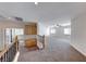 Spacious loft area with wood cabinets and carpet flooring at 10681 Wildhurst St, Las Vegas, NV 89183