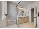 Double vanity bathroom with walk-in shower and built-in bench at 2136 Idaho Falls Dr, Henderson, NV 89044