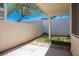 Small grassy backyard with covered patio and block wall at 2150 Polynesia Cir, Henderson, NV 89074