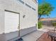 White door leading to a backyard patio area at 2214 Pebble Creek Ln, Laughlin, NV 89029