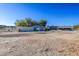 Large backyard with a shed and container at 2440 Robison Farm Rd, Logandale, NV 89021