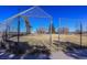 Community baseball field with chain link fence and backstop at 2440 Robison Farm Rd, Logandale, NV 89021