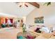 Bright living room, featuring a sectional sofa and a brick fireplace at 3778 Spitze Dr, Las Vegas, NV 89103