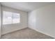 Simple bedroom with neutral walls, carpet, and a large closet at 3875 Sebasco Dr, Las Vegas, NV 89147