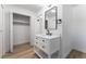 Bathroom with white vanity and marble countertop at 3976 Belleville Ave, Las Vegas, NV 89121